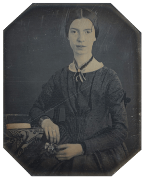 Photograph of Emily Dickinson, seated, at the age of 16