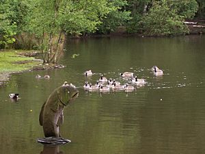 Geese and sculpture of a fish on Coppice Pond - geograph.org.uk - 471276