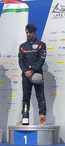 Race pilot Dario Costa podium
