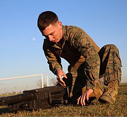 U.S. Marine Corps Cpl. Brett Phares, an armorer with Black Sea Rotational Force (BSRF) 14, assembles a Mark 19 40 mm machine gun during a weapons assembly and disassembly race as part of a competition Jan. 13 140113-M-PY808-678