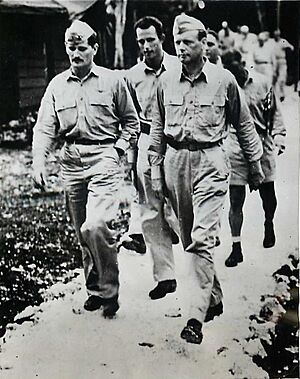 WWII U.S. Marine aces Joe Foss and Marion Carl with Charles Lindbergh (Press Photo)