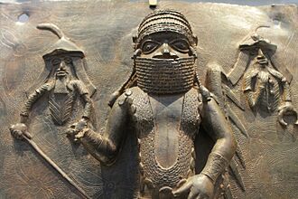 Bronze of Oba Ewuare I, flanked by guards