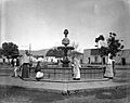 Filling water jars at a fountain in Morelia, Mexico (1906)