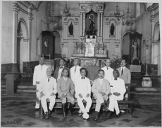 General Aguinaldo (seated, center) and ten of the delegates to the first Assembly of Representatives that passed the Con - NARA - 530993