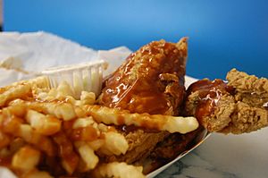 Fried chicken and french fries with mild sauce
