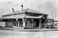 StateLibQld 1 54392 Bank personnel outside the Queensland National Bank, Gympie, ca. 1890
