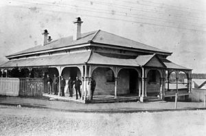 StateLibQld 1 54392 Bank personnel outside the Queensland National Bank, Gympie, ca. 1890