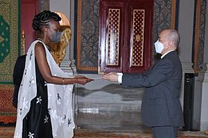 The Ambassador of Rwanda Yasmin D. Amri Sued at the Royal Palace