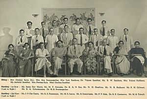 This luncheon group photo with several members of the Sarabhai family. Baroda, 1951