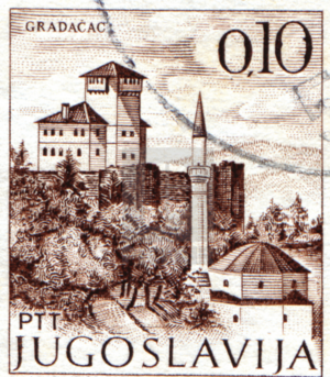 A Yugoslav postage stamp depicting Gradacac with its Gradacac Castle and the Husejnija Mosque
