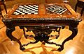 Gaming table with chessboard