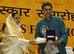 Pratibha Devisingh Patil presented the Dada Saheb Falke Award for the year 2006 to Shri Tapan Sinha. Photo shows Shri Anindya Sinha So Shri Tapan Sinha, receiving the award on behalf of his father on the occasion.jpg