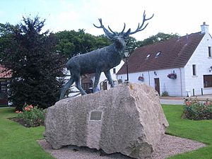 Statue of a stag outside Baxters Highland Village.