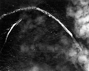 Aerial view of the Japanese aircraft carrier Akagi maneuvering on 4 June 1942 (USAF-57576)