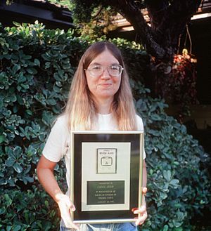 Carol Shaw Holding Gold River Raid Cartridge