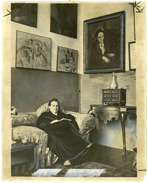 Gertrude Stein sitting on a sofa in her Paris studio - Library of Congress