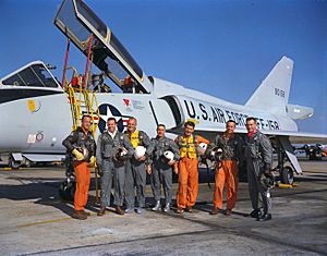 Mercury Seven astronauts with aircraft