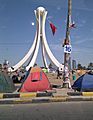 Protesters camped out at the Pearl Roundabout in Bahrain (cropped)
