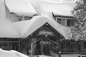 Strawberry Lodge after a winter storm, facing U.S. Route 50