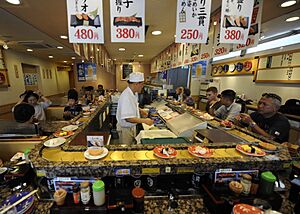 US Navy 090813-N-0413R-250 Sailors and their families enjoy sushi while visiting the historic city of Kamakura, Japan during orientation