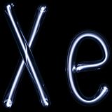 Illuminated violet gas discharge tubes shaped as letters X and e