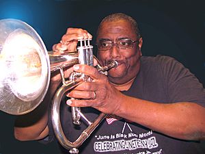 Dr. Myers plays the flugelhorn at a performance in Roland, Oklahoma.jpg