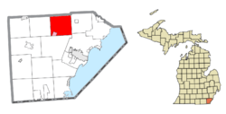 Location within Monroe County (red) and the administered village of Maybee (pink)