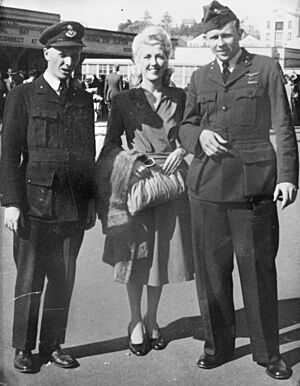 Gus Winckel standing together with others..JPG