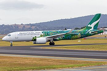 QantasLink, operated by National Jet Systems, (VH-X4A) Airbus A220-300 taxiing at Canberra Airport