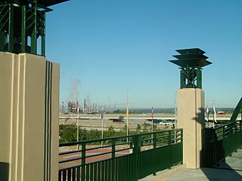 Route 66 pedestrian overpass looking onto Cyrus Avery Plaza.jpg