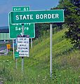 State border sign on NY 17
