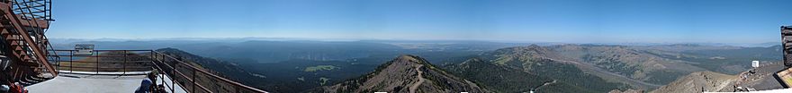Panorama taken from the fire lookout tower on the summit of Mt. Washburn. The center of the image looks south towards the Teton Range.