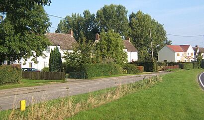 Houses in Alpheton and a stretch of the old road - geograph.org.uk - 971177