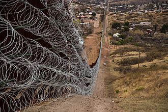 Nogales Border Wall and Concertina Wire - 33141967568.jpg