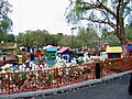 Old-fashioned roses line the walkways by a Lego toddler play area called Duplo Playtown