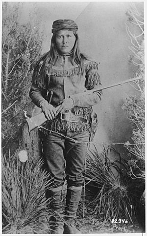 Peaches (Tsoe), a White Mountain Apache scout, full-length, holding rifle, 1885 - NARA - 530799.jpg