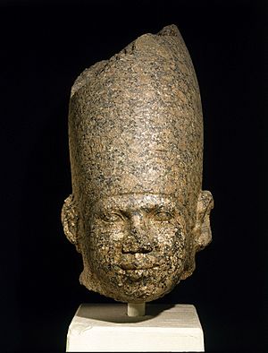 Pink granite head possibly depicting Huni, Brooklyn Museum