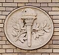 Relief of a torch at the Montreal Mechanics Institute