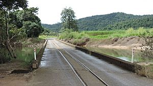 Single lane bridge for road vehicles and cane trains across the Russell River between Babinda (foreground) and East Russell (background), 2018