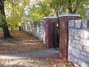 Stone fence, 17th Street with gate