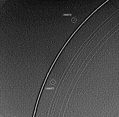 Uranus rings and two moons