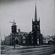 Black-and-white photo of the church, with two spires