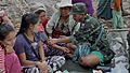 KNLA medic treating displaced civilians (Steve Sandford-VOA)