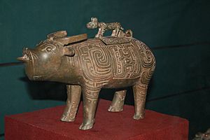 Bronze tiger on top of water buffalo, Zhou Dynasty