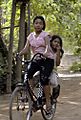 Cambodian girls on bicycle