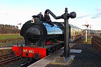Ex-NCB Hunslet Austerity 0-6-0ST No. 60 watering at Alnwick Lionheart Station (1), 28 12 2018.jpg