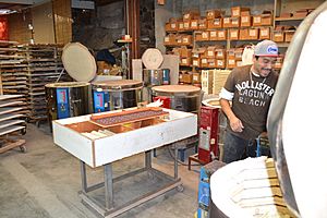 Firing room where multiple kilns are in operation, each with a specific temperature and duration