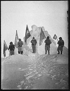 Photograph of the Robert Peary Sledge Party Posing with Flags at the North Pole - NARA - 542472