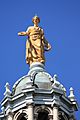 Golden statue of Fame on top of the main dome, Bank of Scotland Head Office, Edinburgh