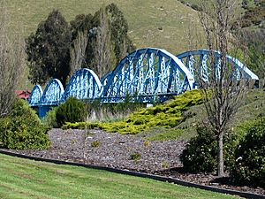 The heritage-listed Millers Flat Bridge, a four span steel truss bridge which crosses the Clutha River